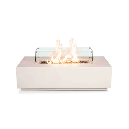 Front product image of the Flame Havens Refuge Series 56 x 30 x 15 inch rectangle natural gas white GFRC concrete fire pit equipped with a tempered glass wind guard and reflective tempered black fire glass. The stainless steel burner produces tall, even flames while the clear wind guard enhances safety without obstructing the contemporary linear fire display.