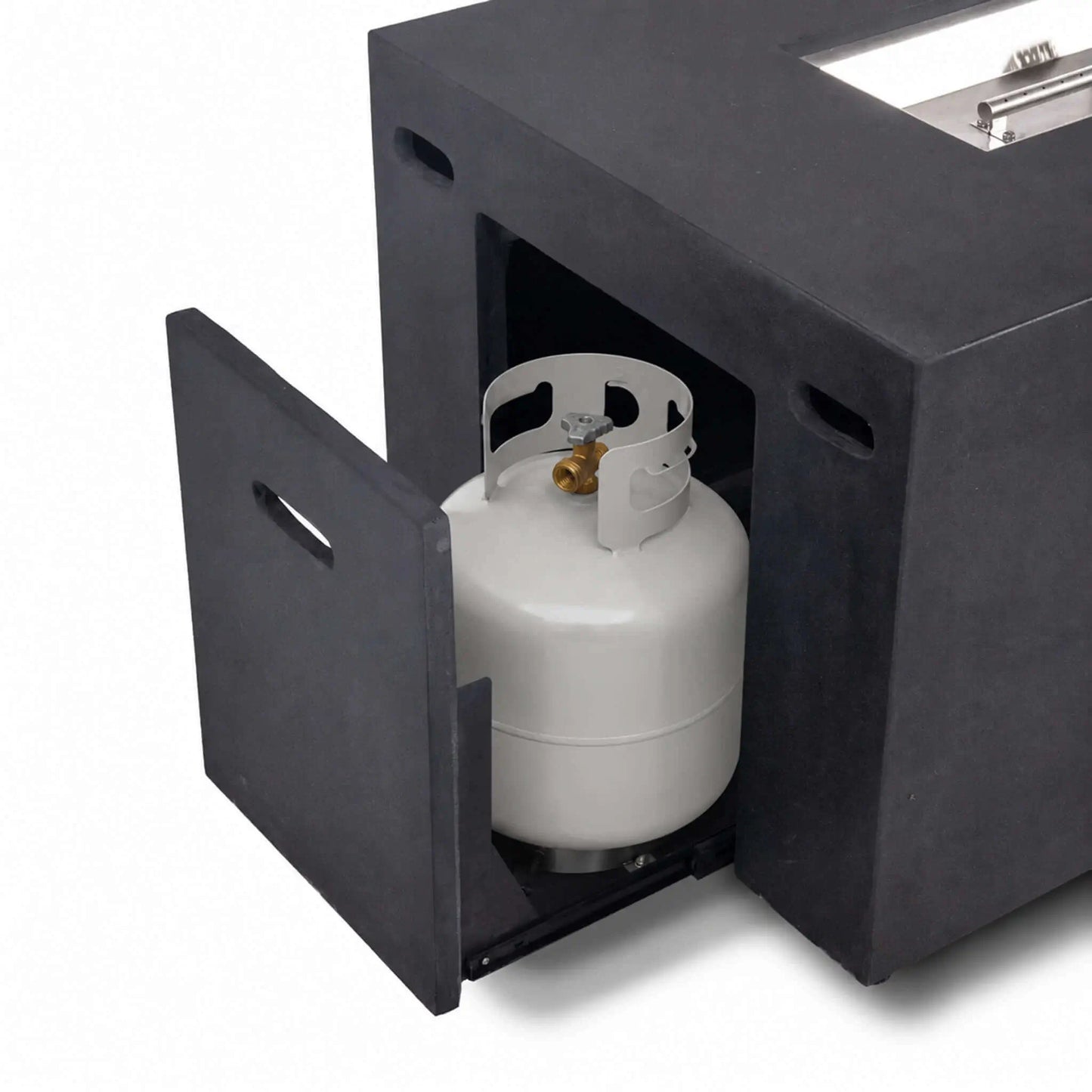 Open hidden propane tank drawer with a standard propane cylinder inside the black Flame Havens Refuge Series 56 x 30 x 24-inch rectangular GFRC concrete fire pit, demonstrating the concealed slide-out tank storage and easy-access door design.