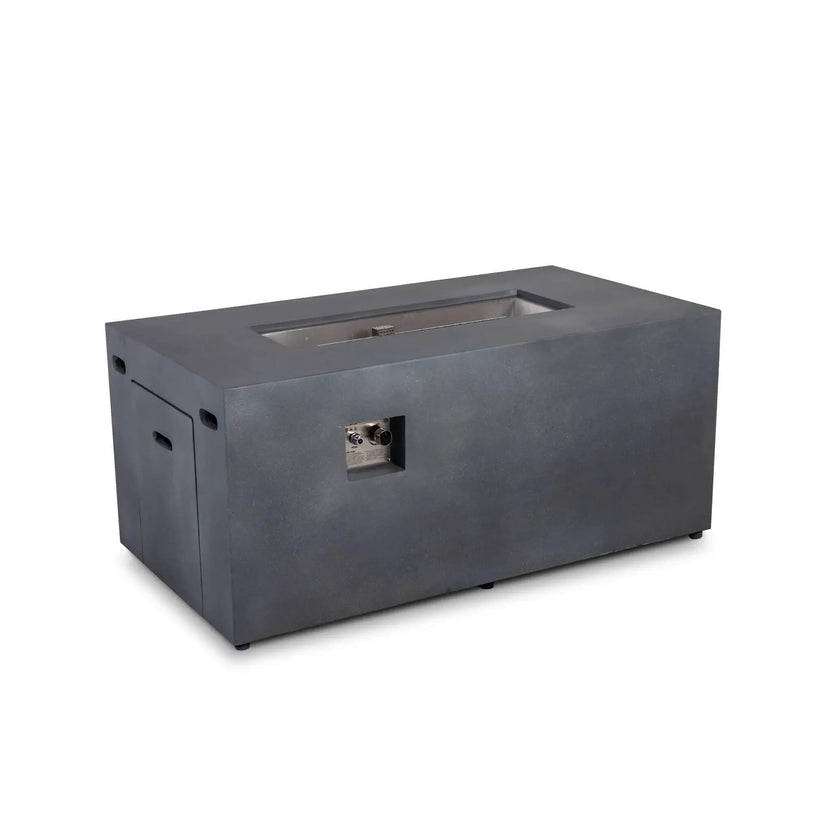 Angled product view of the Flame Havens Refuge Series 56 x 30 x 24-inch rectangular propane gas fire pit in gray GFRC concrete. The image shows its recessed stainless steel burner pan, CSA ignition controls on the front, closed hidden tank drawer and discreet ventilation openings against a white background.