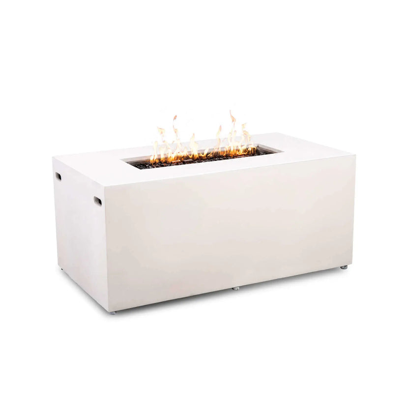 Flame Havens Refuge Series 56 x 30 x 24-inch rectangular propane gas fire pit in white GFRC concrete, shown burning with a linear row of yellow-orange flames above tempered black fire glass, with discreet side vents and no controls visible on the clean front face.
