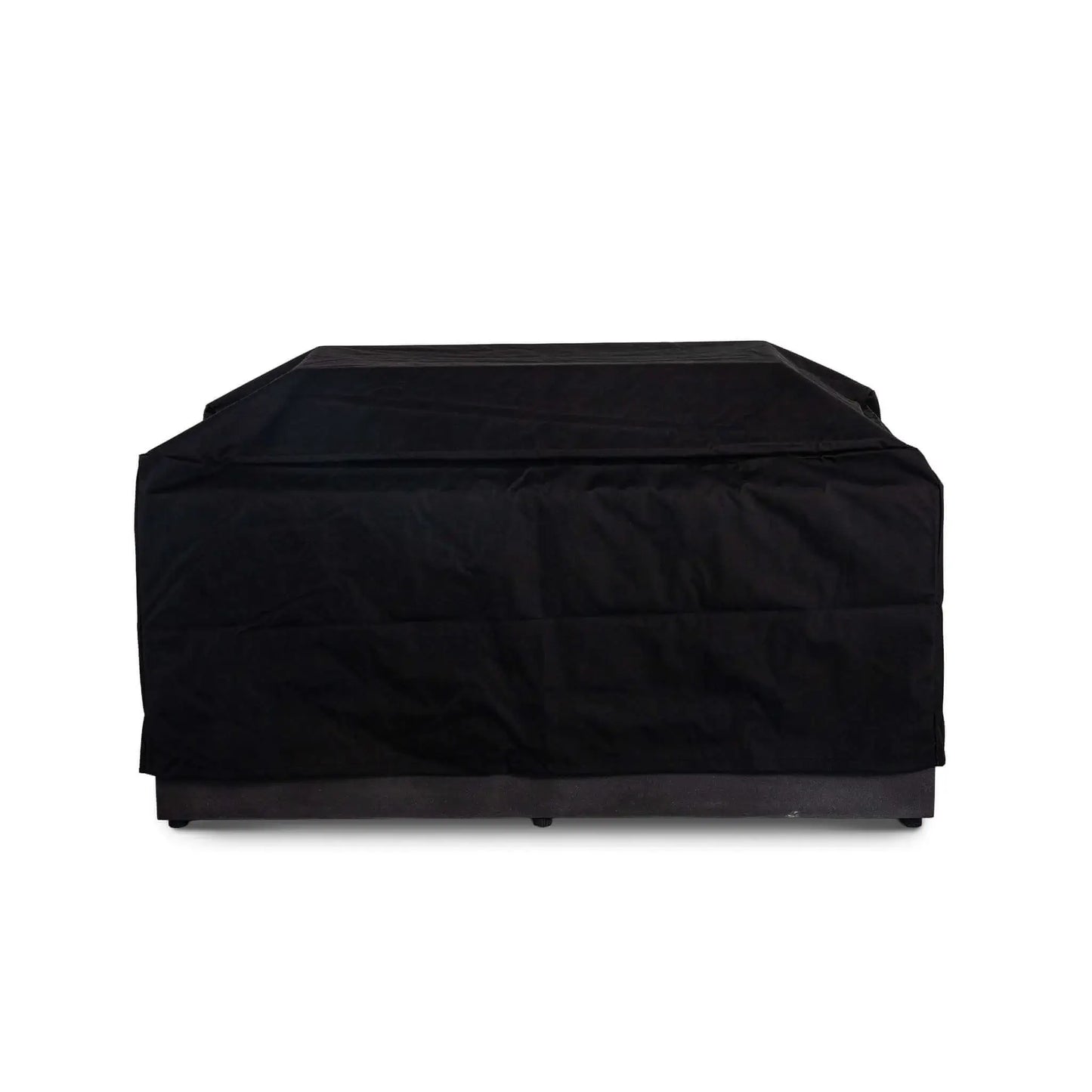 Straight front view of the black canvas fabric cover fitted over the Flame Havens Refuge Series 56 x 30 x 24-inch rectangular GFRC propane fire pit with its glass wind guard underneath. The raised cover accommodates the wind guard while extending across the top and sides of the fire pit.