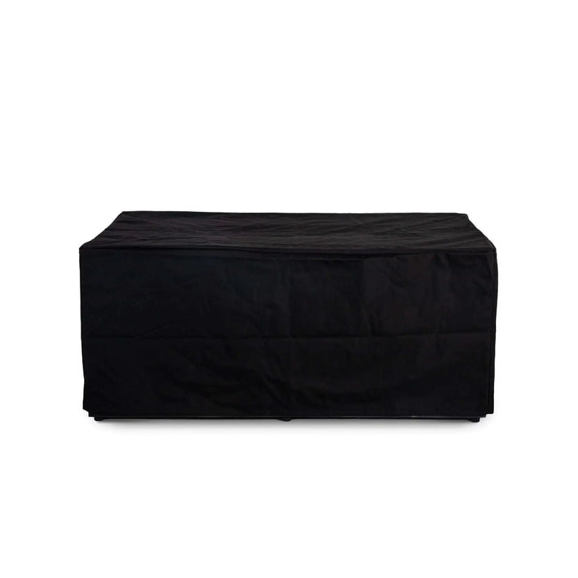 Straight front view of a fitted black canvas fabric cover protecting the Flame Havens Refuge Series 56 x 30 x 24-inch rectangular GFRC concrete propane gas fire pit. The full-length cover extends over the tabletop and sides while preserving the fire pit’s clean rectangular shape.