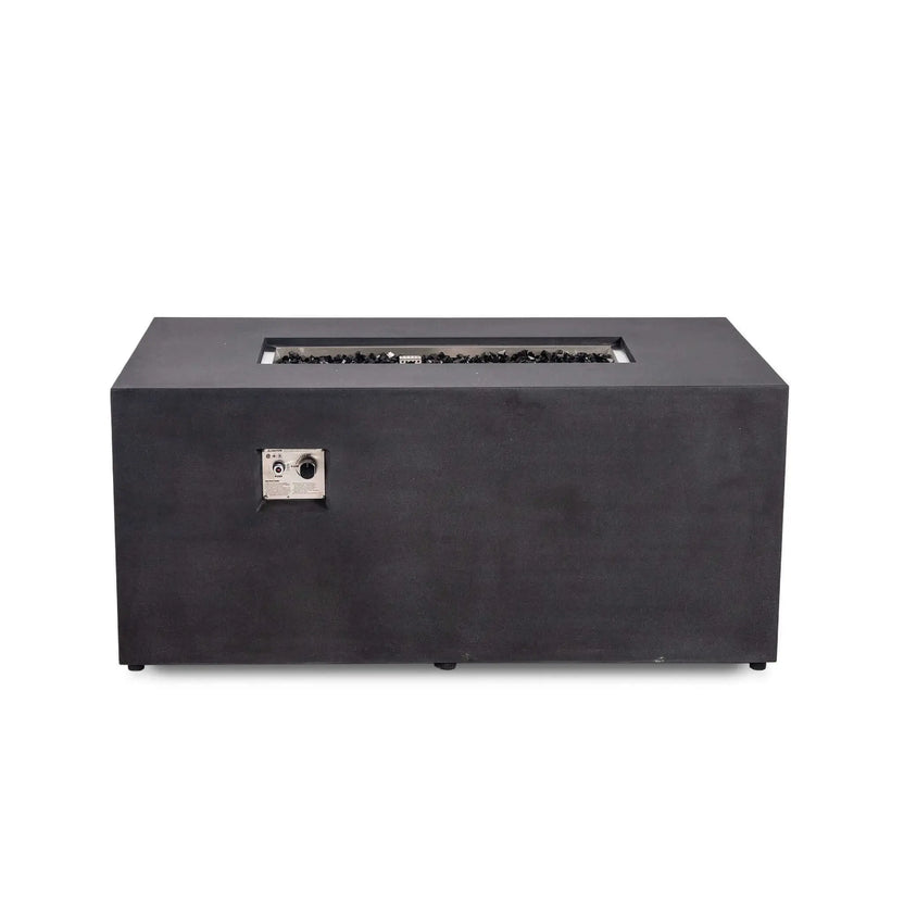 Black Flame Havens Refuge Series 56 x 30 x 24-inch rectangular GFRC propane fire pit shown straight on with the fire off. The recessed burner is filled with tempered black fire glass, and the front-mounted stainless steel control panel includes a push-button igniter and flame adjustment knob.
