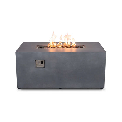 Straight front product view of the Flame Havens Refuge Series 56 x 30 x 24-inch gray GFRC rectangular propane fire pit with the fire on. Yellow-orange flames burn above tempered black fire glass in the recessed stainless steel burner, and the front-mounted ignition button and flame adjustment control are clearly visible.