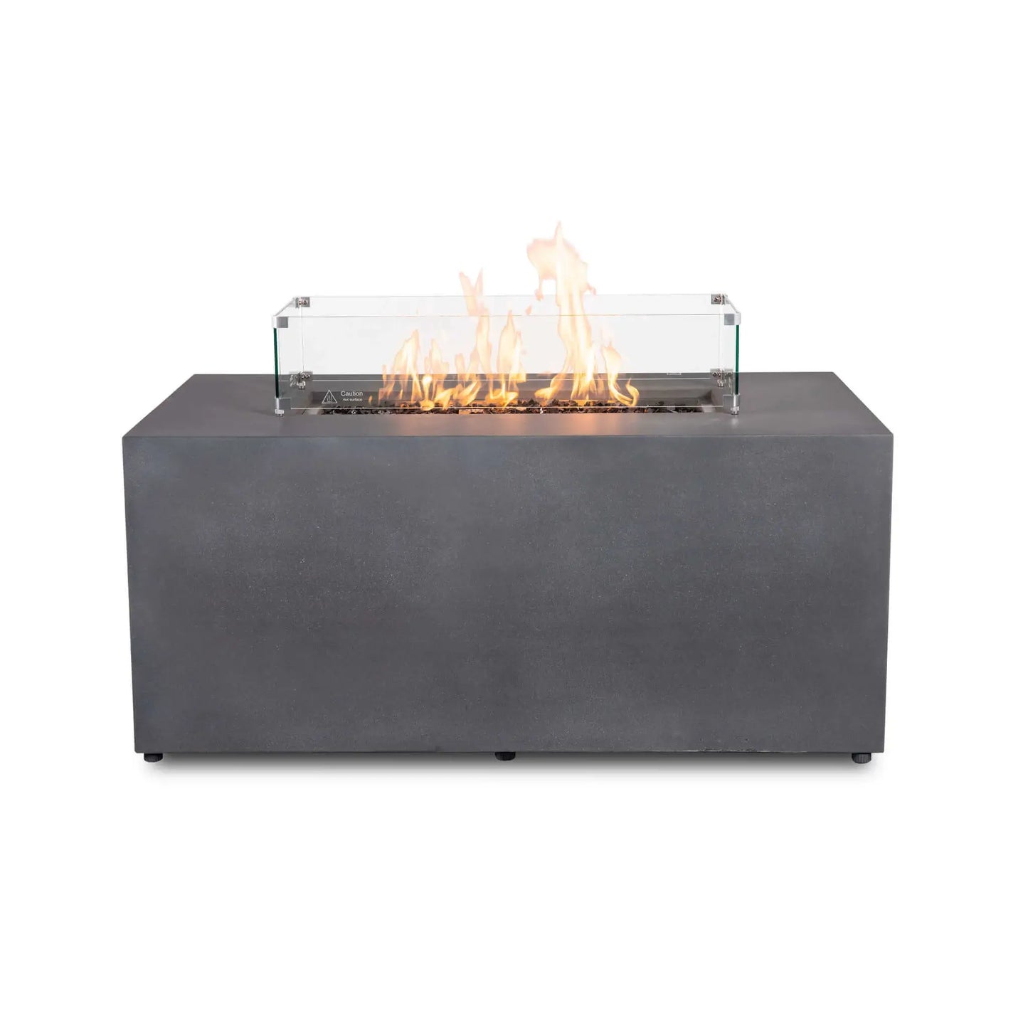 Straight front view of the Flame Havens Refuge Series 56 x 30 x 24-inch rectangular propane gas fire pit in gray GFRC concrete. Bright yellow-orange flames rise from tempered black fire glass behind a clear tempered glass wind guard secured with metal corner brackets. The clean front face and discreet leveling feet are shown against a white background.