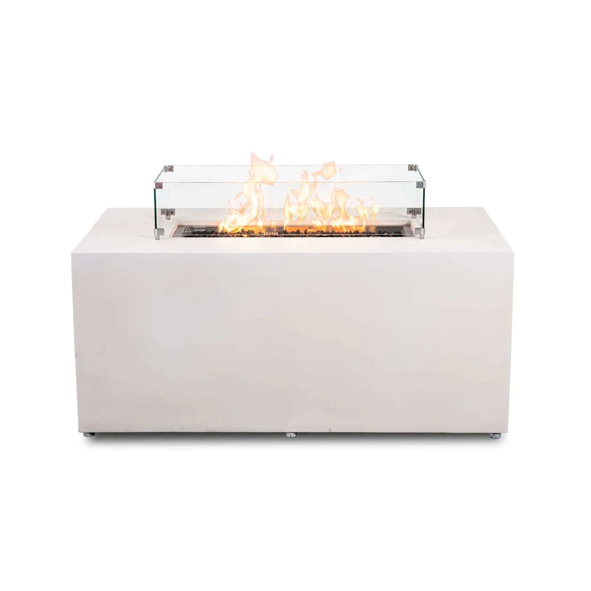 Straight front view of the Flame Havens Refuge Series 56 x 30 x 24-inch rectangular propane gas fire pit in white GFRC concrete, shown burning over tempered black fire glass with a clear tempered glass wind guard, polished metal corner brackets, raised feet, a wide tabletop ledge, and discreet adjustable feet.