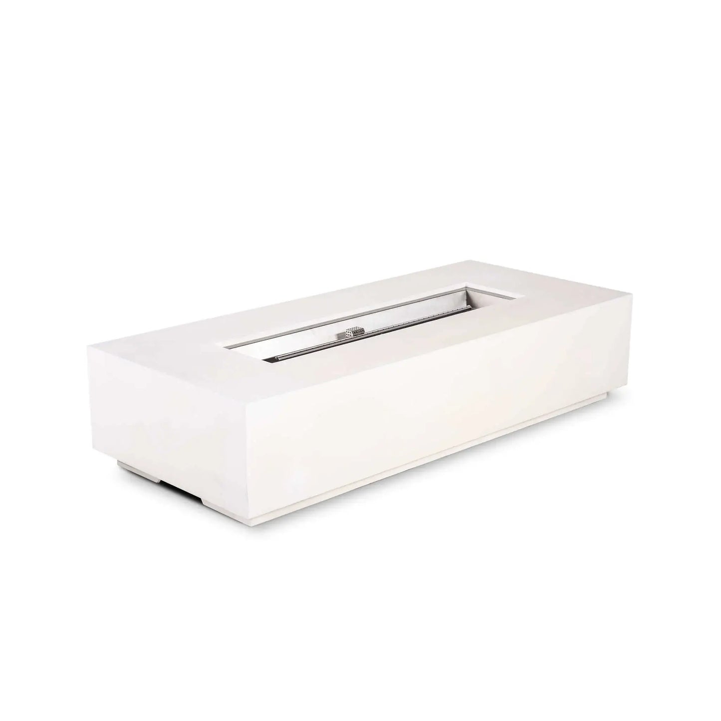 Flame Havens Refuge Series 68 x 30 x 15-inch rectangular natural gas fire pit shown at an angle on a white background. The white GFRC concrete body surrounds an open stainless steel burner pan with a linear burner and CSA ignition assembly, while no control panel is visible on the near-facing side.