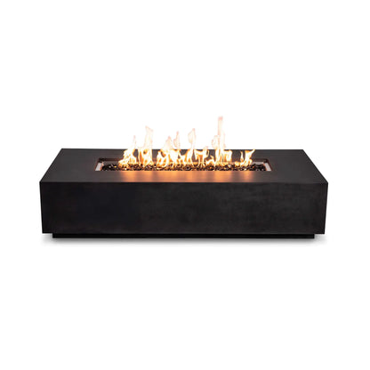 Straight-on view of the Flame Havens Refuge Series 68 x 30 x 15-inch black GFRC rectangular natural gas fire pit with no controls visible. A broad line of orange and yellow flames rises from reflective tempered black fire glass inside the recessed stainless steel burner pan.