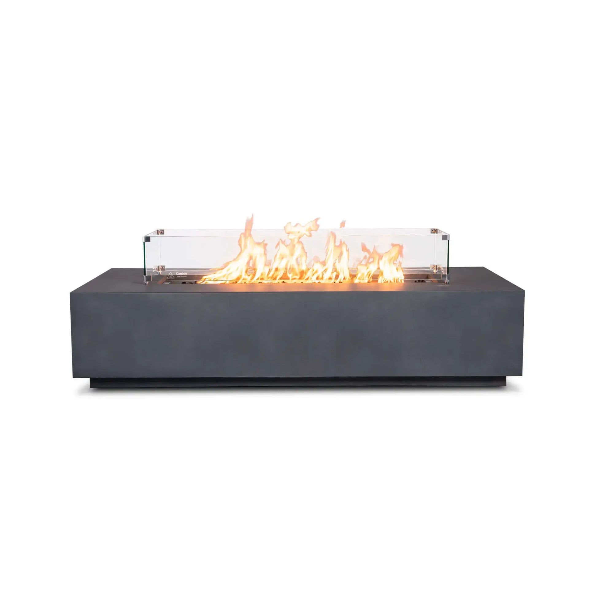 Straight front product view of the Flame Havens Refuge Series 68 x 30 x 15-inch rectangular natural gas fire pit in gray GFRC concrete. A line of bright flames rises over tempered black fire glass inside a clear tempered glass wind guard, displayed against a clean white background.