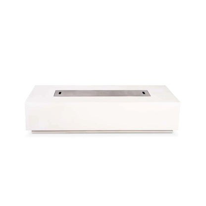 Straight front studio view of the Flame Havens Refuge Series 68 x 30 x 15-inch rectangular natural gas fire pit in white GFRC concrete. A brushed stainless steel burner cover sits flush in the long central opening, creating a clean tabletop surface, with no controls visible on the front face.