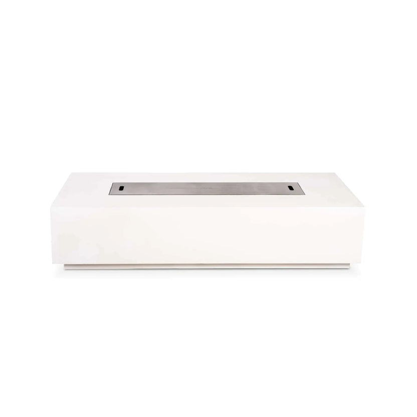 Straight front studio view of the Flame Havens Refuge Series 68 x 30 x 15-inch rectangular natural gas fire pit in white GFRC concrete. A brushed stainless steel burner cover sits flush in the long central opening, creating a clean tabletop surface, with no controls visible on the front face.