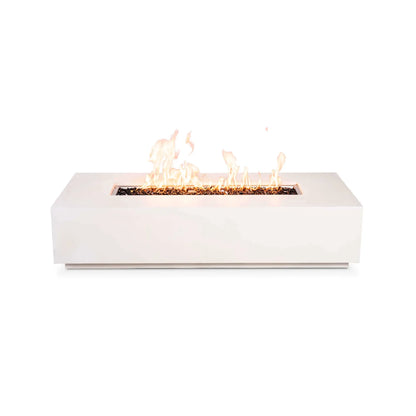 Flame Havens Refuge Series 68 x 30 x 15-inch rectangular natural gas fire pit in white GFRC concrete, shown burning from a straight front view. Tall golden flames rise across the tempered black fire glass in the linear burner opening, with no controls visible on the front face.