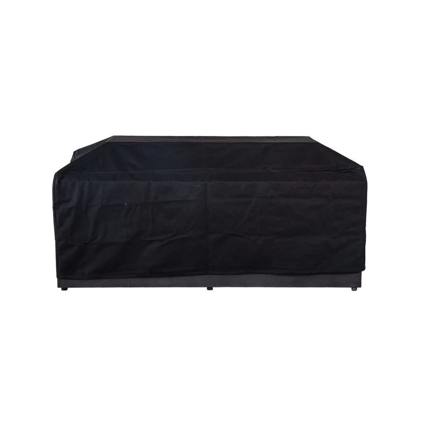 Straight front view of the Flame Havens Refuge Series 68 x 30 x 24-inch rectangular black GFRC concrete propane fire pit beneath a fitted canvas fabric cover designed to accommodate the raised glass wind guard. The shaped cover protects both the fire pit body and installed wind guard.