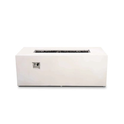 Straight front view of the Flame Havens Refuge Series 68 x 30 x 24-inch white GFRC rectangular propane fire pit with the flame off. Tempered black fire glass fills the long stainless steel burner pan, while the recessed ignition button and flame control knob are visible on the front panel.