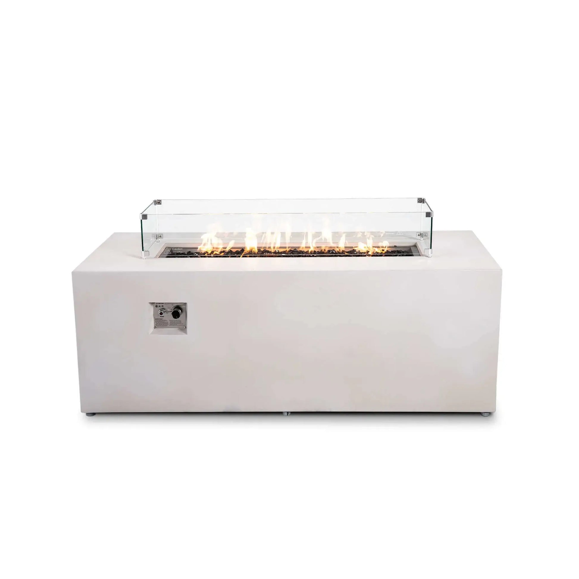 Straight product view of the Flame Havens Refuge Series 68 x 30 x 24-inch white GFRC propane fire pit with the fire on. Tempered black fire glass and glowing flames are enclosed by a clear tempered glass wind guard with stainless steel corner brackets and raised mounting feet.