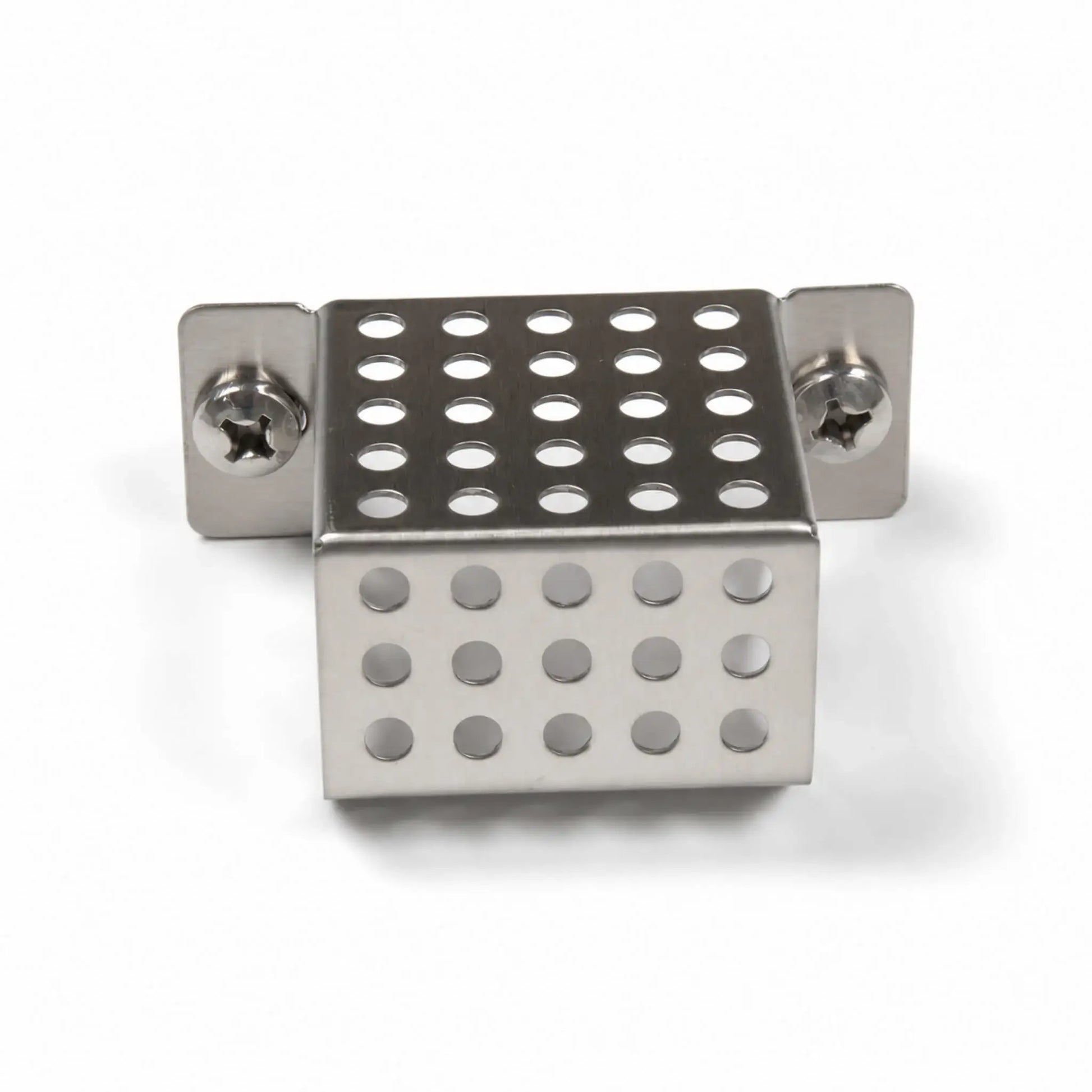 Front view of the Flame Havens Refuge Series ignition shield on a white background. The compact stainless steel fire pit part features a perforated, box-shaped cover with rows of round ventilation holes, folded mounting tabs, and two Phillips-head screws securing the shield assembly.