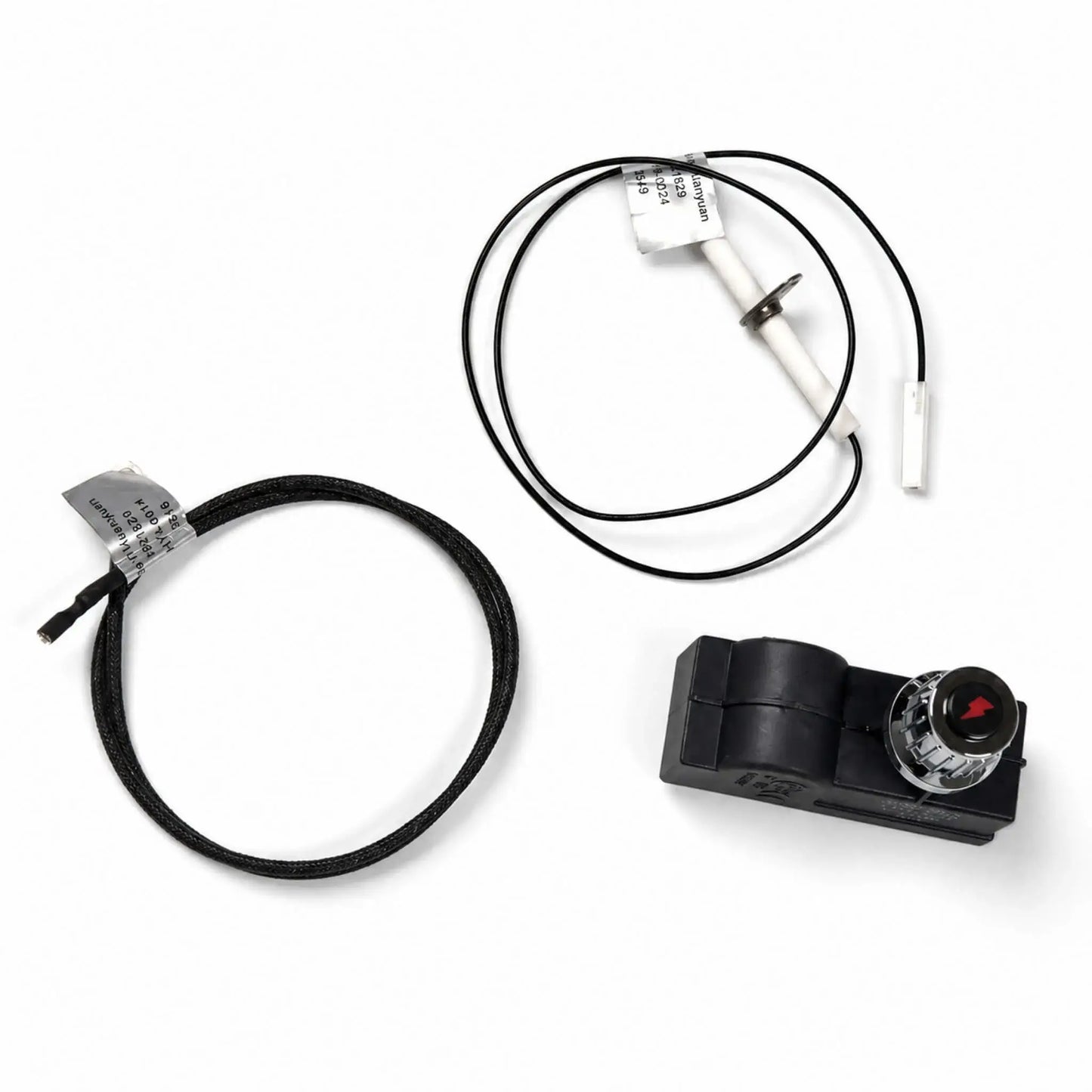 Flame Havens Refuge Series spark ignition kit arranged on a white background. The fire pit replacement set includes a black push-button igniter with red flame symbol, white ceramic electrode probe, connecting lead, and braided ground wire with terminal ends for completing the ignition circuit.