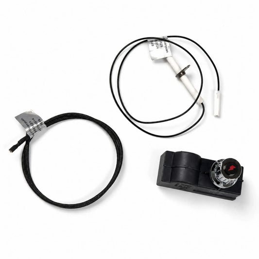Flame Havens Refuge Series spark ignition kit arranged on a white background. The fire pit replacement set includes a black push-button igniter with red flame symbol, white ceramic electrode probe, connecting lead, and braided ground wire with terminal ends for completing the ignition circuit.
