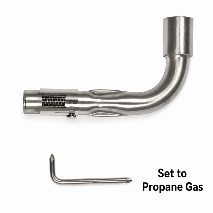 Flame Havens Refuge Series propane and natural gas Venturi pipe shown in the propane position. The stainless steel L-shaped pipe features a curved burner connection and an adjustable sleeve exposing the mesh air intake screen. An L-shaped adjustment tool appears below, with bold text reading “Set to Propane Gas” in the lower-right corner.