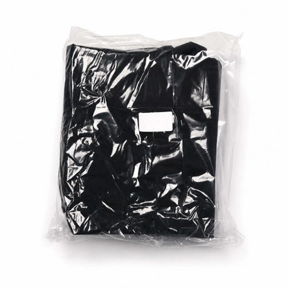 Flame Havens Refuge and Serenity Series fabric canvas cover accessory, folded and sealed inside clear protective packaging. The black cover is shown against a white background with its stitched fabric panels visible through the plastic and a blank rectangular identification label centered on the front.
