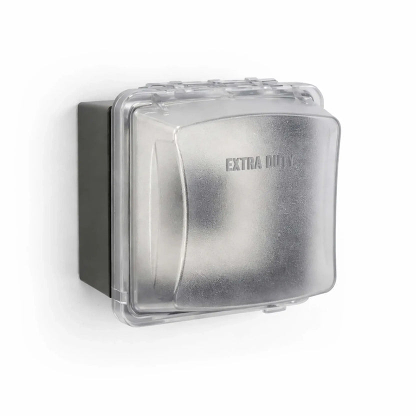 Weatherproof NEMA-rated enclosure with a translucent hinged cover labeled “EXTRA DUTY,” protecting an internal timer control. The rugged housing is designed for outdoor electrical applications, shielding the timer from moisture, dust, and environmental exposure in commercial or residential setups.