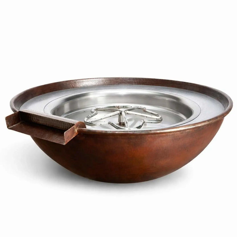 Studio product image of HPC Tempe copper round fire and water bowl on a clean white background, featuring a hammered copper exterior, smooth stainless steel burner pan, and integrated scupper spillway. The circular burner ring sits centered inside the bowl, showcasing a sleek, modern fire feature designed for outdoor patios and poolside installations.