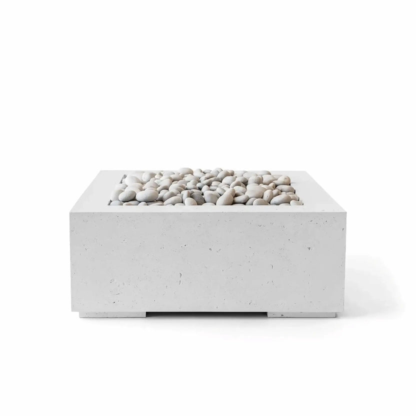 HPC Fire Hearth Products Controls Dekko GFRC Concrete Alea 32 x 32 Fire Pit in Ash finish featuring smooth ivory decorative stones. This modern square outdoor fire pit showcases a clean-lined glass fiber reinforced concrete construction with a recessed burner area, low-profile contemporary design, and neutral gray color ideal for patios, outdoor lounges, and residential backyard fire feature installations.