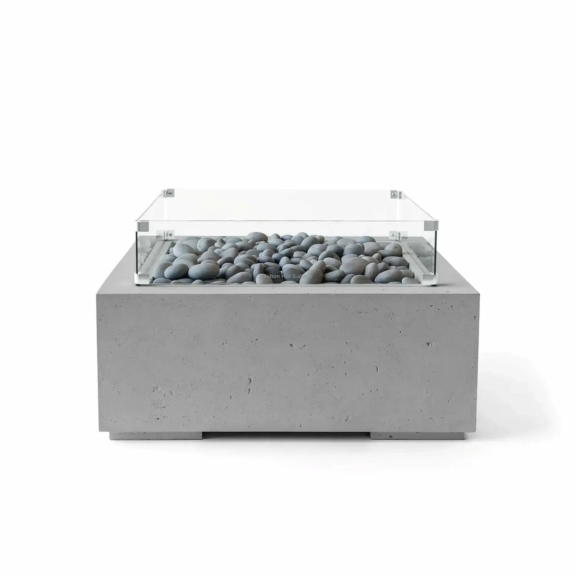 Studio product image of the HPC Fire Hearth Products Controls Dekko GFRC Concrete Alea 32 x 32 Fire Pit in Charcoal finish with gray slate stone media and a tempered glass wind guard. The square outdoor fire table combines modern GFRC concrete construction, neutral tones, and decorative fire stones for a refined contemporary patio centerpiece.