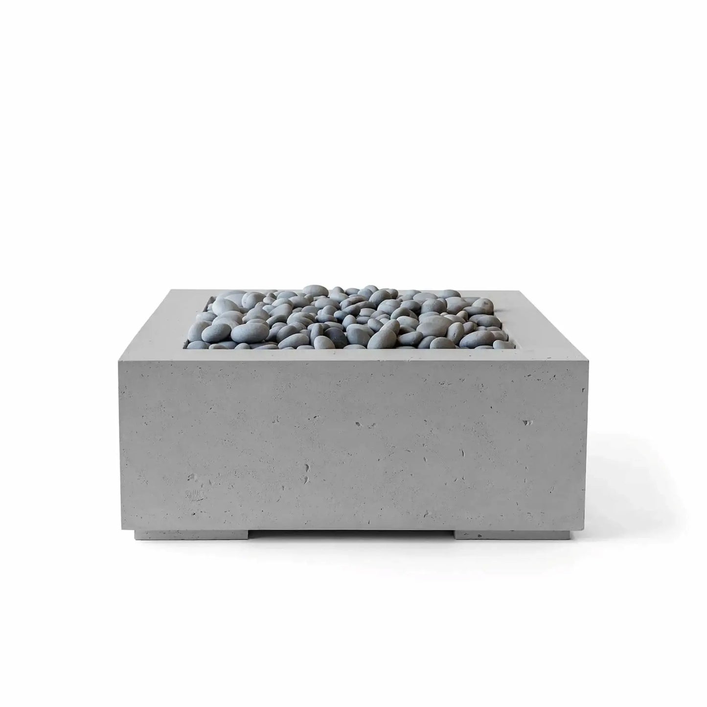 HPC Fire Hearth Products Controls Dekko GFRC Concrete Alea 32 x 32 Fire Pit in Charcoal finish with smooth slate stone media. The square fire pit features a minimalist architectural profile, textured concrete exterior, and decorative gray stones surrounding the burner area, delivering a sophisticated outdoor fire feature for modern patios, terraces, and backyard entertainment spaces.