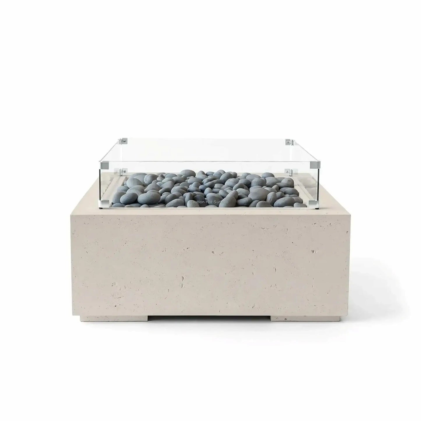 Front-facing product photo of the HPC Fire Hearth Products Controls Dekko GFRC Concrete Alea 32 x 32 Fire Pit in Clay finish featuring smooth gray slate stones beneath a clear tempered glass wind guard. The square fire pit showcases durable GFRC concrete construction, modern styling, and decorative fire media designed for upscale outdoor living environments.
