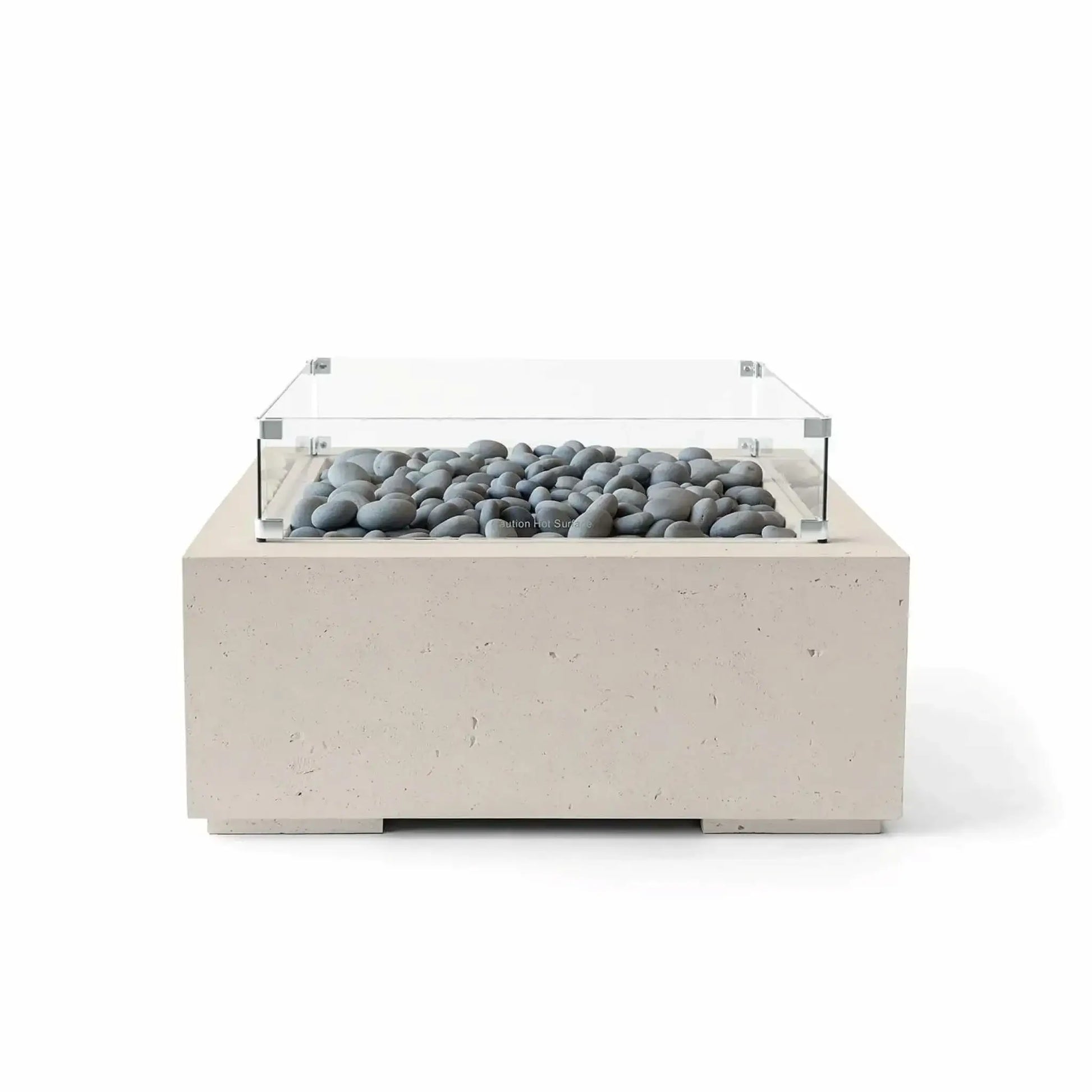 Front-facing product photo of the HPC Fire Hearth Products Controls Dekko GFRC Concrete Alea 32 x 32 Fire Pit in Clay finish featuring smooth gray slate stones beneath a clear tempered glass wind guard. The square fire pit showcases durable GFRC concrete construction, modern styling, and decorative fire media designed for upscale outdoor living environments.