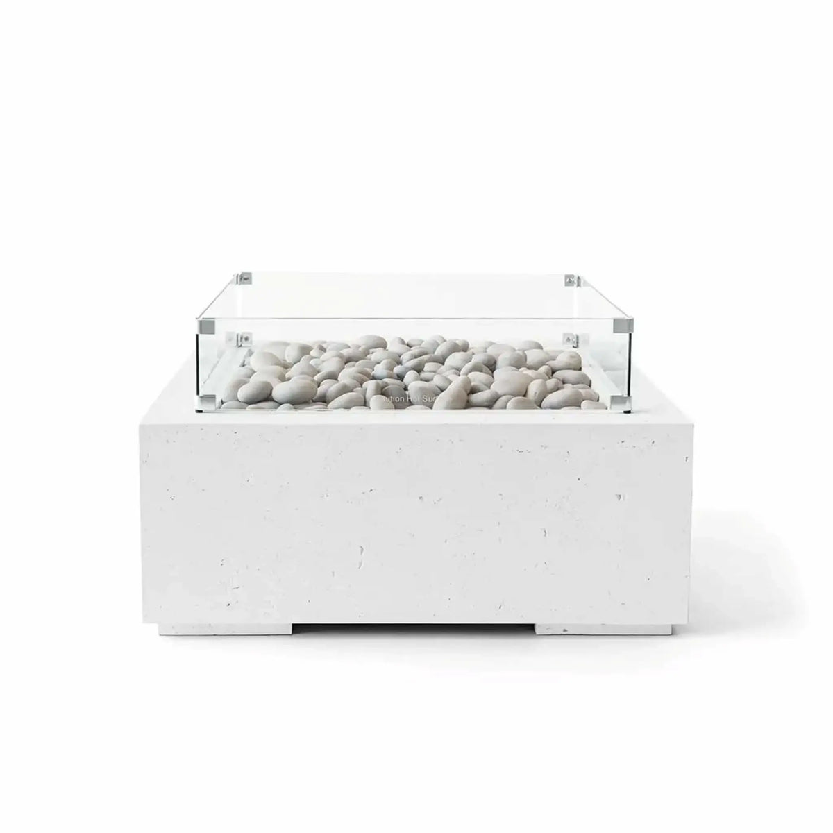 Front view of the HPC Fire Hearth Products Controls Dekko GFRC Concrete Alea 32 x 32 Fire Pit in Natural finish with decorative ivory fire stones and a clear tempered glass wind guard. The square fire pit features durable GFRC concrete construction, a lightly textured natural gray surface, and a sleek low-profile design that complements contemporary outdoor living spaces.