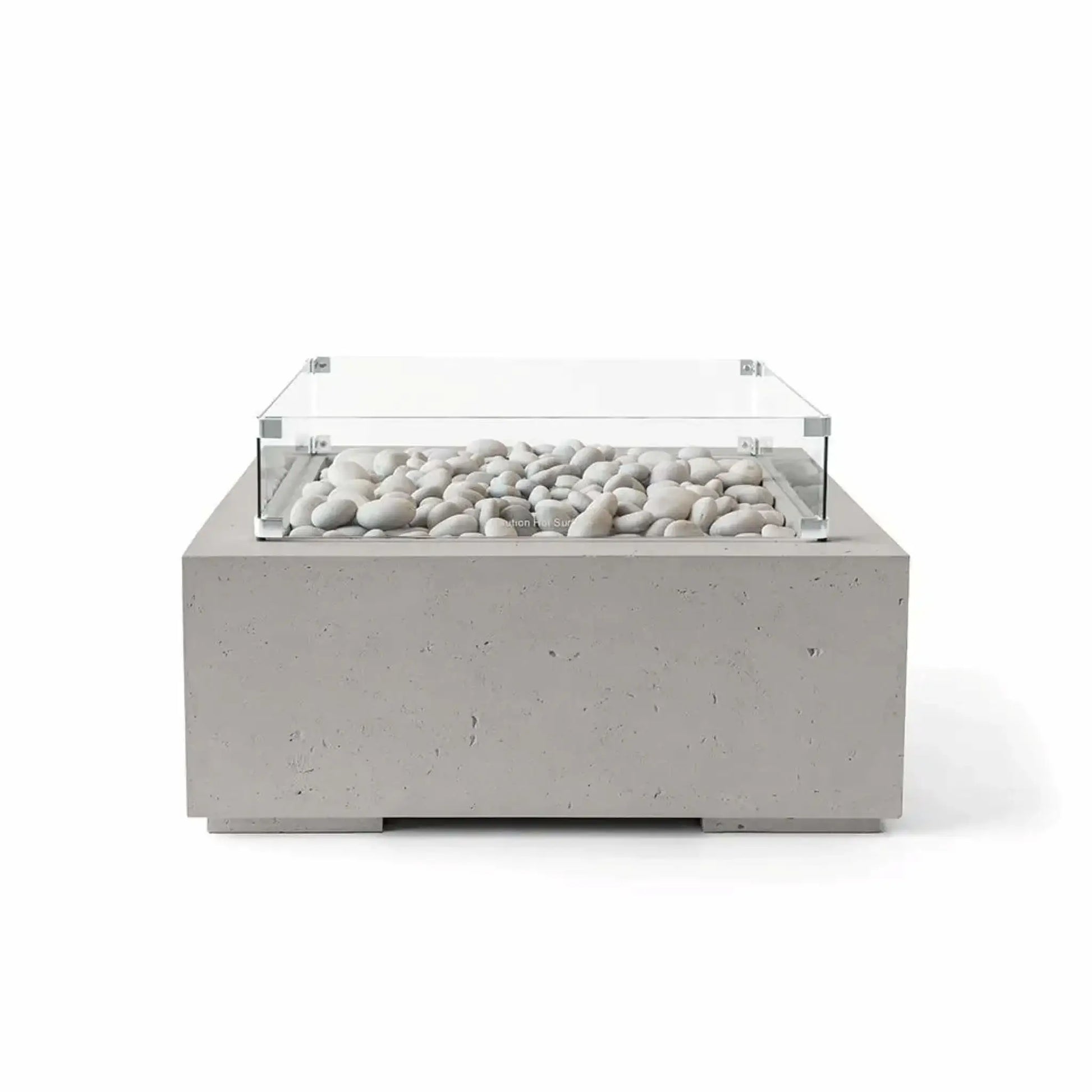 HPC Fire Hearth Products Controls Dekko GFRC Concrete Alea 32 x 32 Fire Pit in Sandstone finish featuring ivory fire stones and a clear tempered glass wind guard. The square GFRC concrete fire pit displays a warm sandstone-colored exterior, clean geometric profile, and decorative stone media, making it a stylish centerpiece for modern patios and outdoor gathering areas.