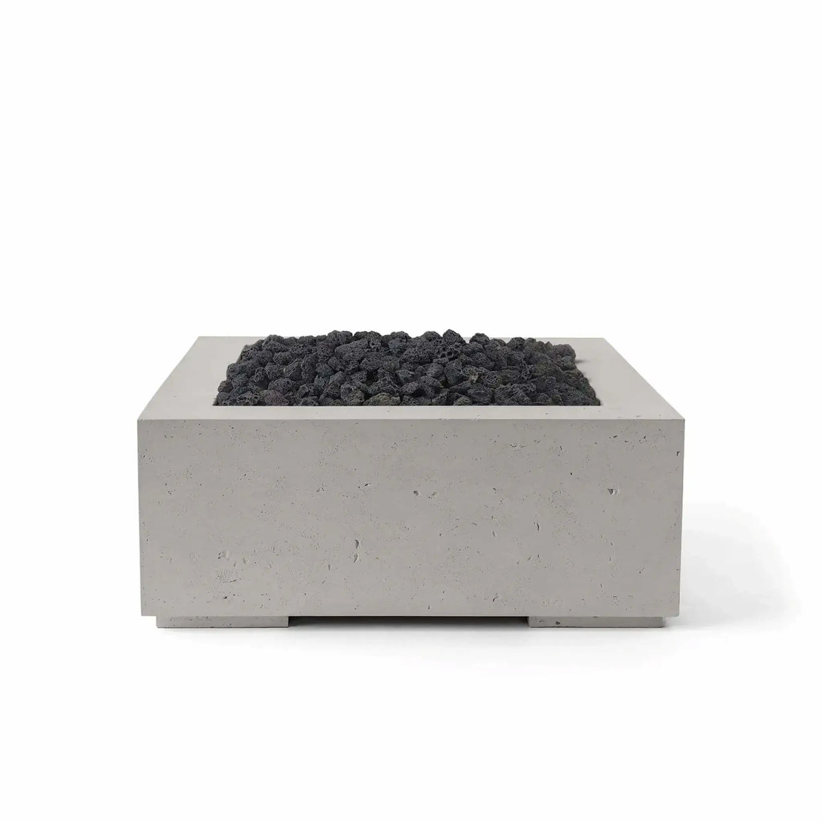 HPC Fire Hearth Products Controls Dekko GFRC Concrete Alea 32 x 32 Fire Pit featuring a Sandstone finish and black lava rock media. The square GFRC concrete fire pit showcases contemporary design, a recessed burner section, and rugged volcanic rock that creates striking contrast against the warm sandstone tone. Ideal for outdoor entertaining areas, patios, and landscape projects, the Alea fire pit offers a timeless modern appearance.