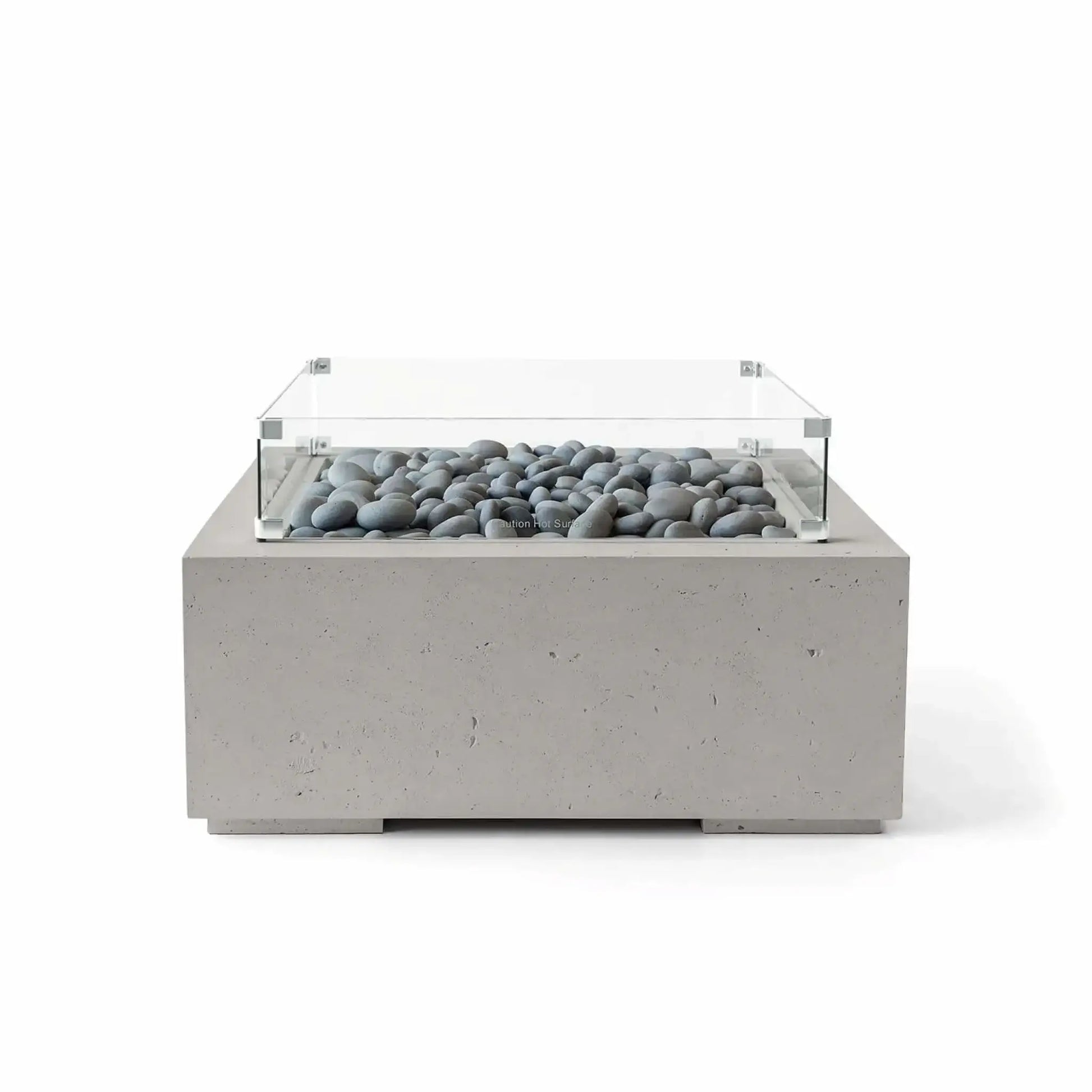 HPC Fire Hearth Products Controls Dekko GFRC Concrete Alea 32 x 32 Fire Pit in Sandstone finish with smooth gray slate stone fire media and a tempered glass wind guard. This square outdoor fire pit features a textured GFRC concrete construction, warm sandstone appearance, and modern low-profile silhouette designed for contemporary outdoor entertaining spaces.