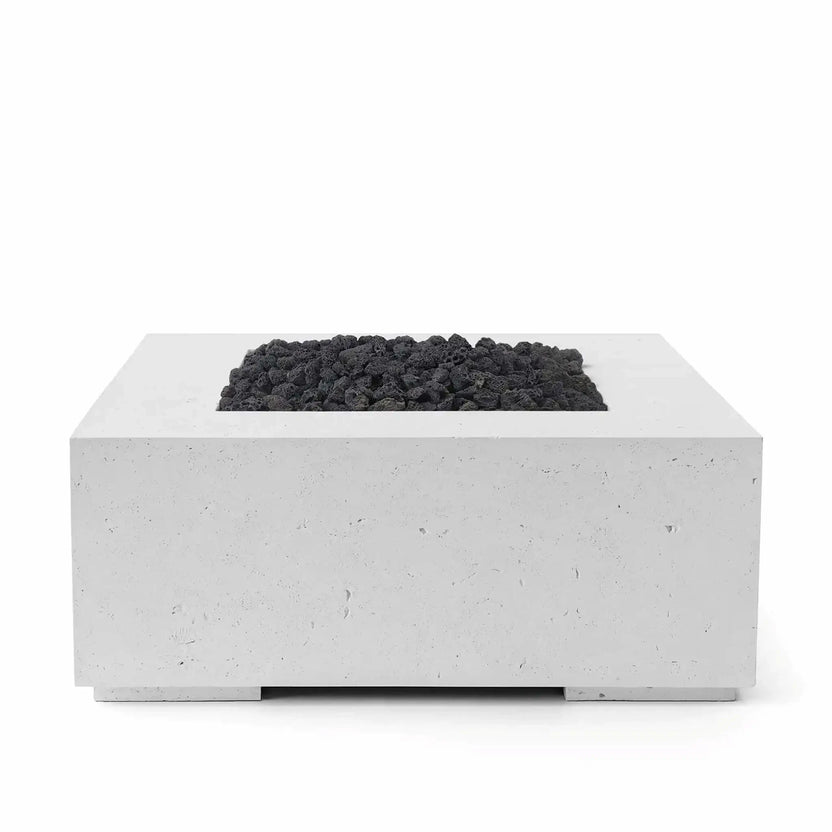 HPC Fire Hearth Products Controls Dekko GFRC Concrete Alea 40 x 40 Fire Pit in Ash finish with black lava rock burner media. The square GFRC concrete fire pit features a contemporary light gray ash-colored exterior and a recessed fire bowl filled with natural volcanic lava rock. Displayed against a clean white background, this outdoor gas fire pit combines modern styling, durable construction, and a sleek architectural appearance.