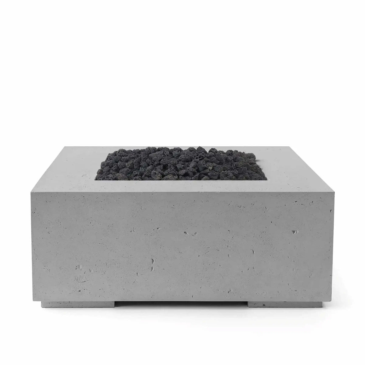 HPC Fire Hearth Products Controls Dekko GFRC Concrete Alea 40 x 40 Fire Pit in Charcoal finish featuring black lava rock media. The square GFRC concrete fire pit has a clean modern design with a recessed burner tray filled with rugged volcanic rock. Its dark charcoal finish, minimalist styling, and durable outdoor construction make it a bold focal point for patios, courtyards, and outdoor gathering spaces.