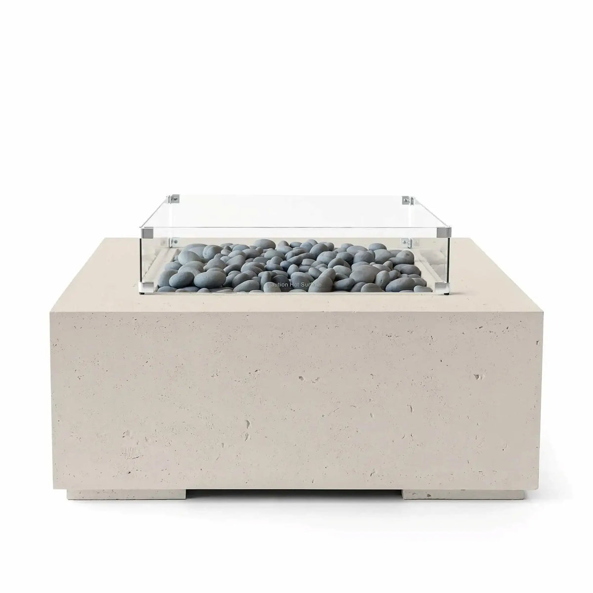 HPC Fire Hearth Products Controls Dekko GFRC Concrete Alea 40 x 40 Fire Pit in Clay finish with smooth slate stone fire media beneath a tempered glass wind guard. The durable GFRC concrete construction features a warm neutral color and minimalist square shape, making it ideal for modern patios and outdoor gathering spaces. Professional product image on a white background.