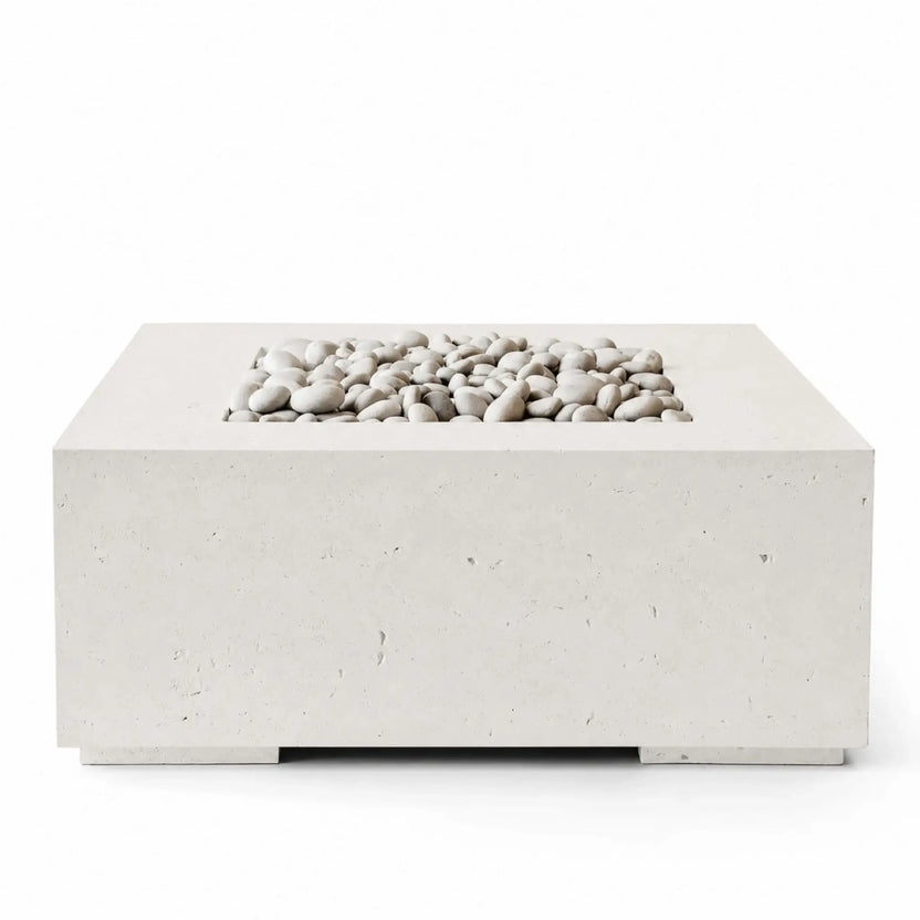 HPC Fire Hearth Products Controls Dekko GFRC Concrete Alea 40 x 40 Fire Pit in Limestone finish with Ivory Stone media. This front-facing studio product image highlights the clean-lined square concrete fire pit, recessed burner area filled with smooth ivory river stones, durable GFRC construction, and minimalist architectural styling designed for contemporary outdoor patios and gathering spaces.