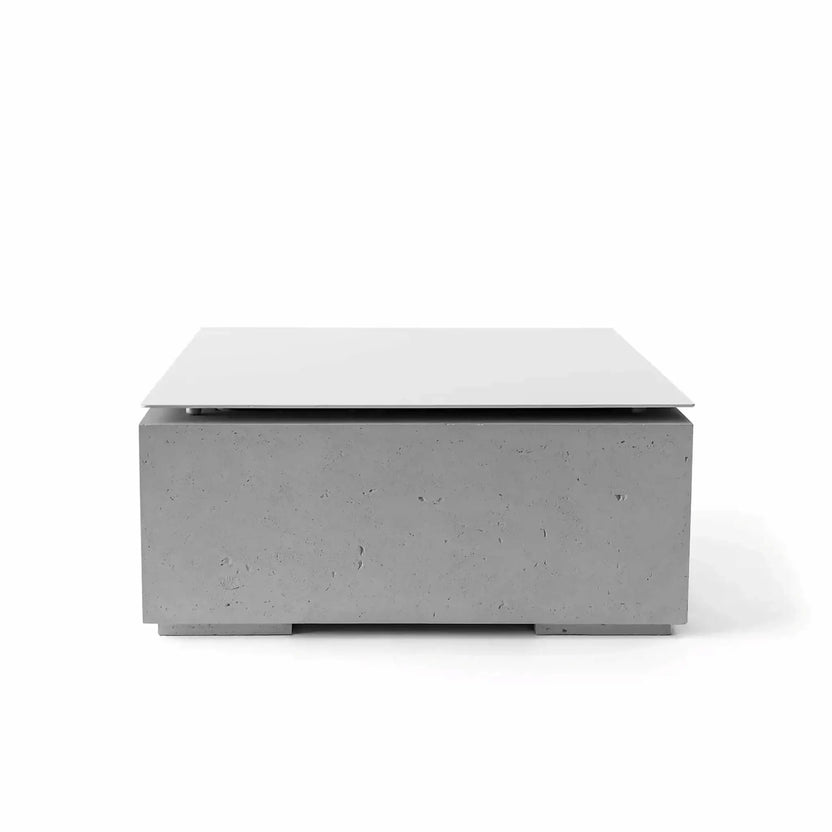HPC Fire Hearth Products Controls Dekko GFRC Concrete Alea Bravo 32 x 32 Fire Pit Charcoal Table Top Lid displayed against a white background. The square protective lid sits atop a charcoal gray GFRC concrete fire pit base featuring a contemporary minimalist design with textured concrete detailing. This outdoor fire pit accessory converts the fire feature into a functional tabletop while protecting the burner and fire media from weather and debris.