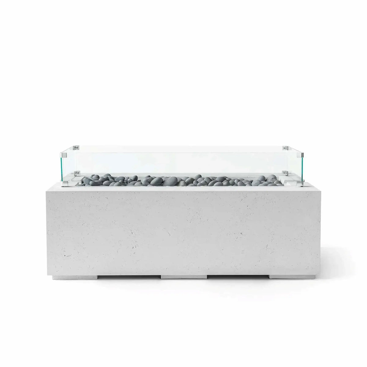 HPC Fire & Hearth Products Dekko GFRC Concrete Avera 48 x 26 Fire Pit Ash Slate Stone Tempered Glass Wind Guard featuring gray slate stone fire media within a linear burner channel. The ash-finished GFRC concrete fire pit table is paired with a transparent tempered glass wind guard that adds safety, improves flame stability, and complements the sleek modern styling of upscale outdoor living environments.