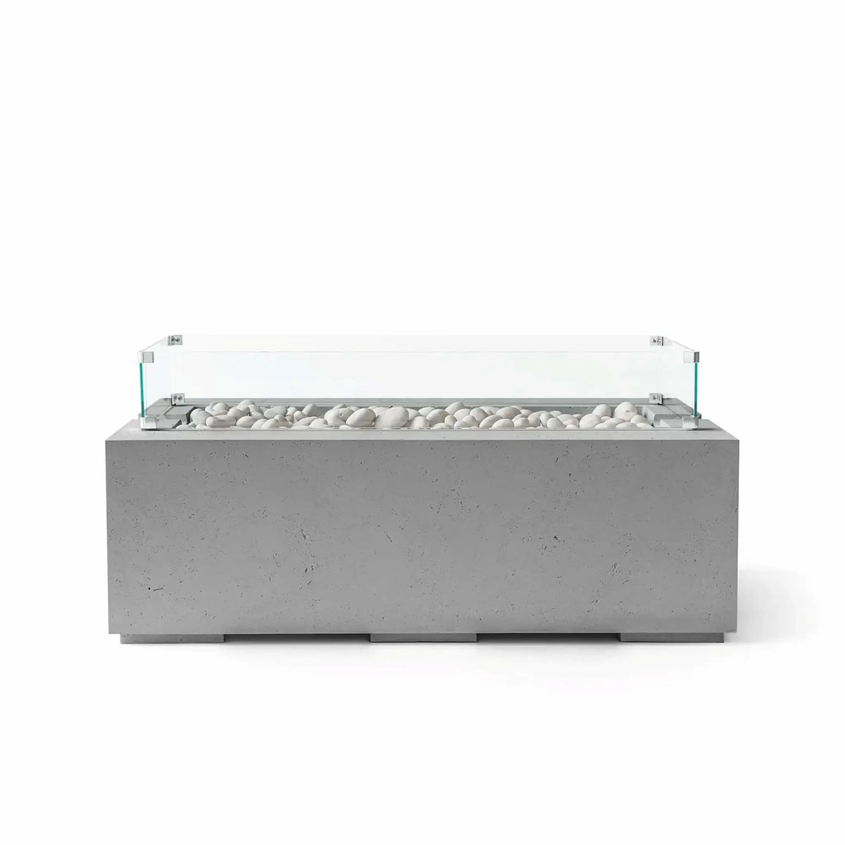 HPC Fire & Hearth Products Dekko GFRC Concrete Avera 48 x 26 Fire Pit Charcoal Ivory Stone Tempered Glass Wind Guard displayed with a rich charcoal concrete finish and smooth ivory fire stones. The rectangular fire table features a clear tempered glass wind guard surrounding the burner area, creating a sophisticated contrast while helping protect flames in exposed outdoor settings.