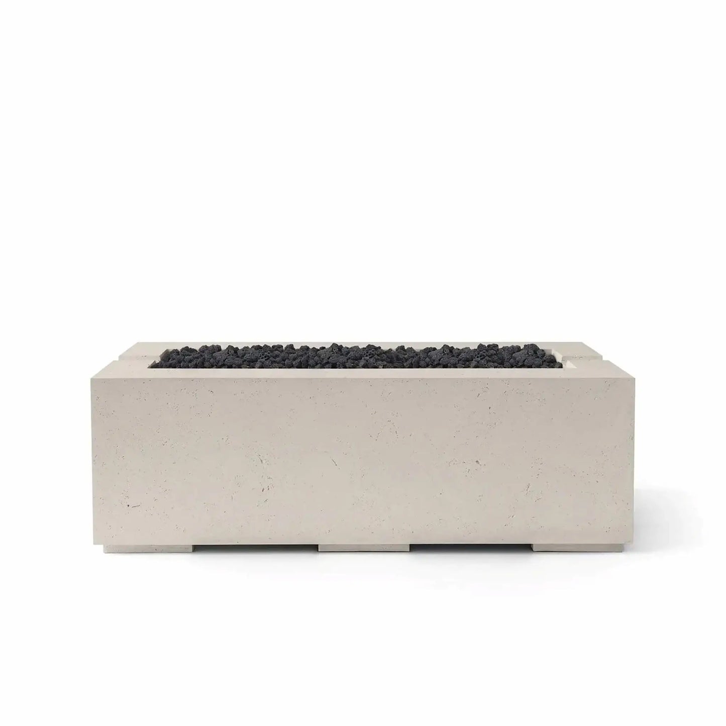 HPC Fire & Hearth Products Controls Dekko GFRC Concrete Avera 48 x 26 Fire Pit in Clay finish with black Lava Rock media. The rectangular GFRC concrete fire pit features a recessed linear burner opening filled with textured volcanic rock, creating strong visual contrast against the light clay-colored body. Shown on a clean white background, this Avera fire pit offers modern style and durable performance for outdoor entertaining areas.