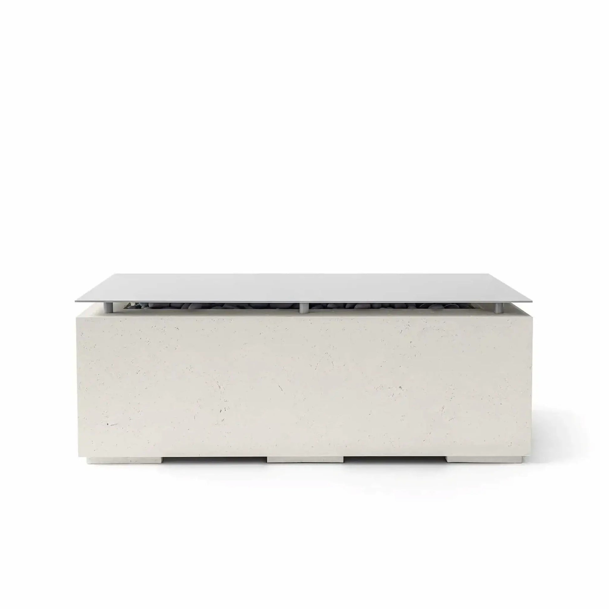 HPC Fire & Hearth Products Dekko GFRC Concrete Avera 48 x 26 Fire Pit Limestone Table Top Lid shown in a soft limestone finish. The rectangular fire pit table features a textured GFRC concrete body, elevated metal lid, and minimalist outdoor design. The tabletop cover conceals the fire pit opening and media beneath, allowing the Avera fire feature to double as a stylish outdoor coffee table for patios and entertaining spaces.