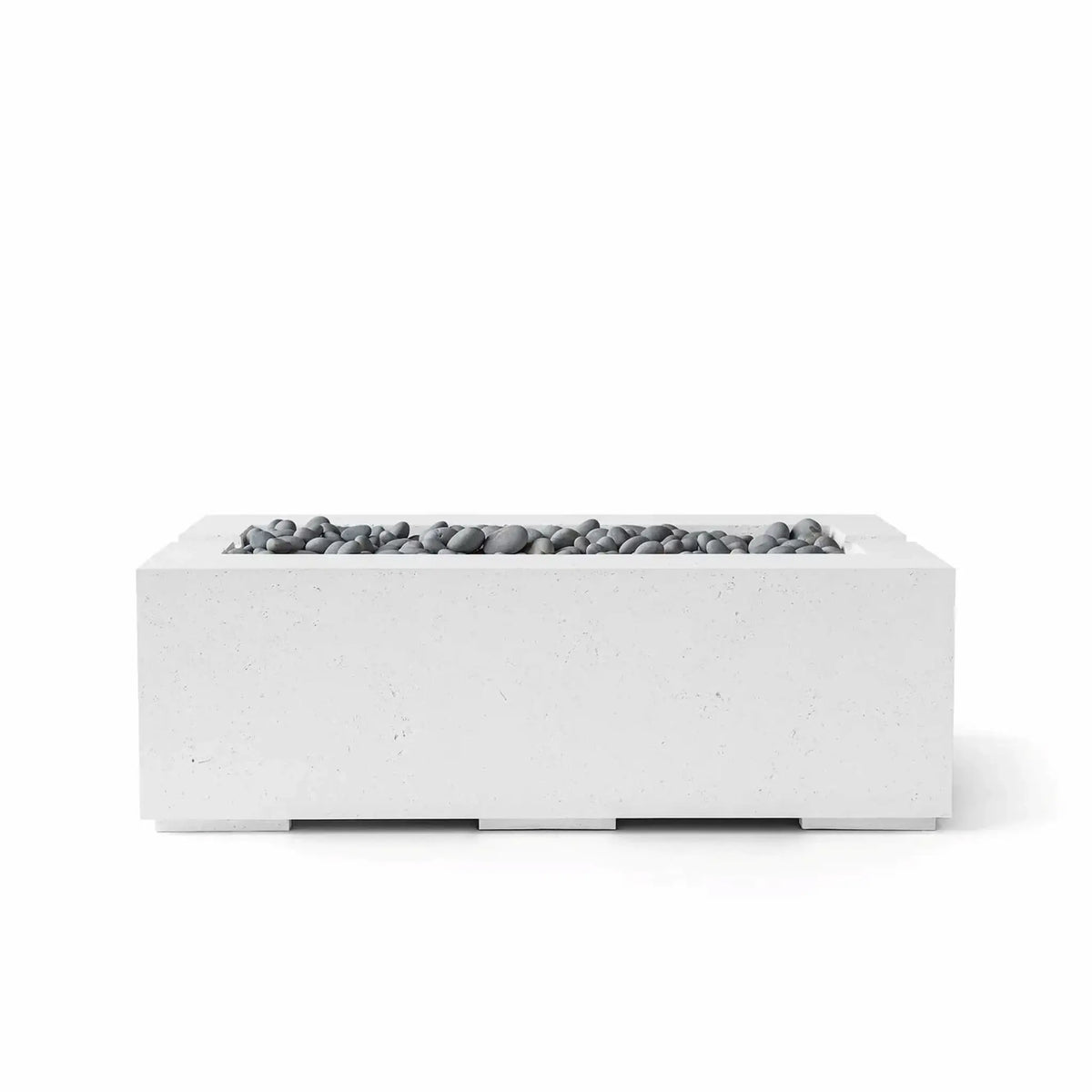 HPC Fire & Hearth Products Controls Dekko GFRC Concrete Avera 48 x 26 Fire Pit in Natural finish with Slate Stone media. The rectangular fire pit features a clean-lined GFRC concrete body in a soft gray tone complemented by smooth gray slate stones arranged within the recessed linear burner opening. Displayed on a white background, the Avera fire pit offers a balanced modern aesthetic designed for contemporary patios, poolside environments, and luxury outdoor living areas.
