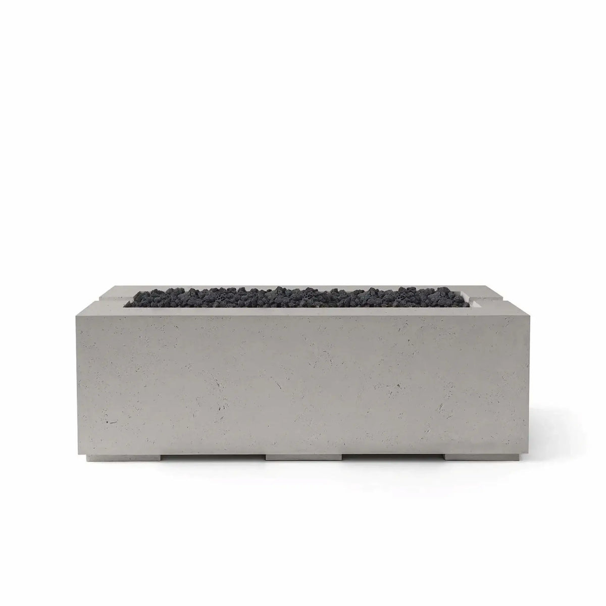 HPC Fire & Hearth Products Controls Dekko GFRC Concrete Avera 48 x 26 Fire Pit in Sandstone finish with Lava Rock media. The warm sandstone-toned rectangular concrete fire pit is contrasted by dark black lava rock filling the recessed burner area, creating a bold contemporary appearance. Displayed against a white background, this Avera fire pit highlights the combination of premium GFRC concrete construction, modern outdoor design, and versatile fire media options for luxury patio spaces.