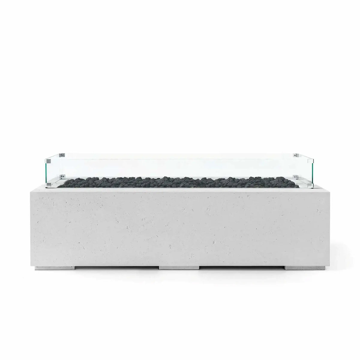 HPC Fire Hearth Products Controls Dekko GFRC Concrete Avera 60 x 26 Fire Pit in Ash finish with natural black lava rock media and a tempered glass wind guard surrounding the linear burner. The rectangular GFRC concrete fire pit features a modern architectural profile, textured gray surface, and low-profile design, creating a stylish focal point for contemporary outdoor entertaining areas and patio installations.