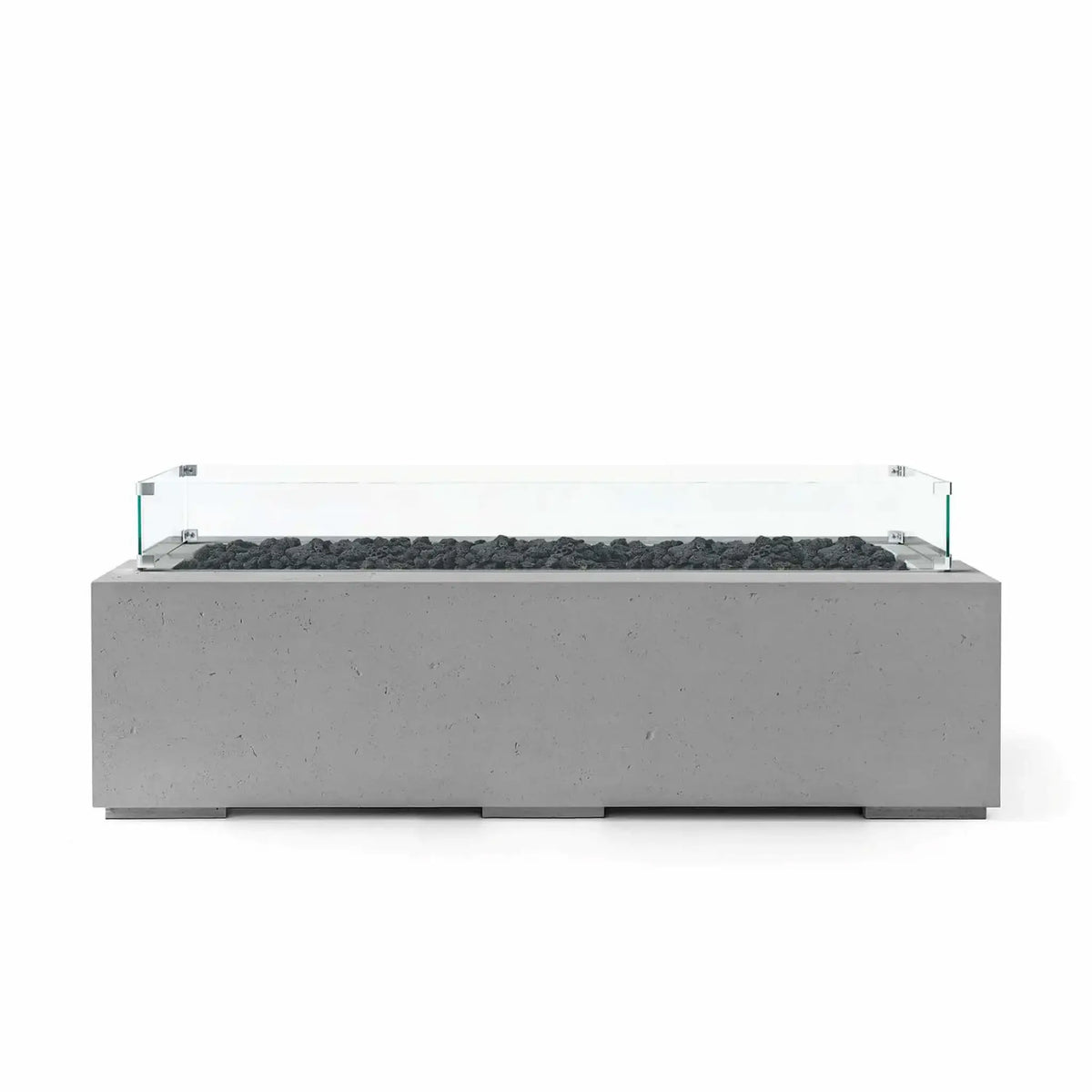 HPC Fire Hearth Products Controls Dekko GFRC Concrete Avera 60 x 26 Fire Pit featuring a Charcoal finish, black lava rock media, and a clear tempered glass wind guard. The sleek rectangular fire pit combines textured GFRC concrete construction with a modern linear burner layout, creating a sophisticated outdoor centerpiece suitable for patios, terraces, and luxury backyard entertainment spaces.