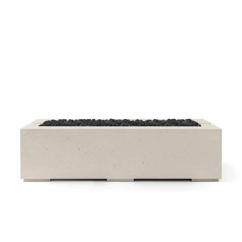 Product image of the Dekko GFRC Concrete Avera 60 x 26 Fire Pit from HPC Fire Hearth Products Controls in Clay finish with Lava Rock media. The neutral-toned concrete body and dark volcanic rock create striking contrast, while the rectangular linear design delivers a modern outdoor fire pit solution for patios, courtyards, and gathering spaces.
