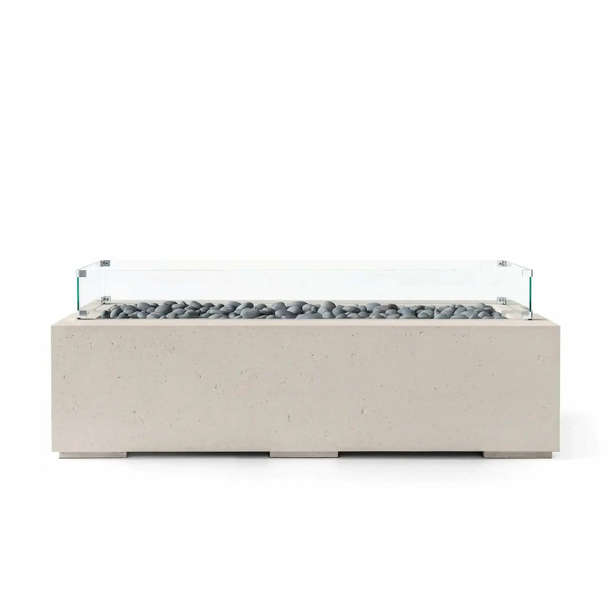 HPC Fire Hearth Products Controls Dekko GFRC Concrete Avera 60 x 26 Fire Pit in Clay finish with gray slate stone media and a clear tempered glass wind guard. The modern rectangular fire pit features a streamlined GFRC concrete body, elevated base supports, and a long linear burner area designed to enhance contemporary patios, outdoor lounges, and residential gathering spaces.